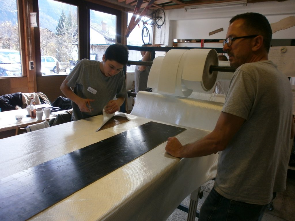 Cutting the fiberglass mats to size