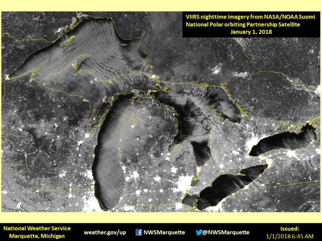 Satellite image, New Year's night. You can see the Lake Effect clouds and the illuminated towns.